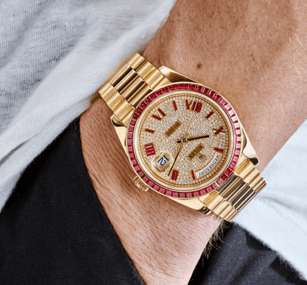 Day-date yellow gold roman dial ruby bezel 40mm