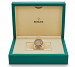 Day-date yellow gold roman dial ruby bezel 40mm