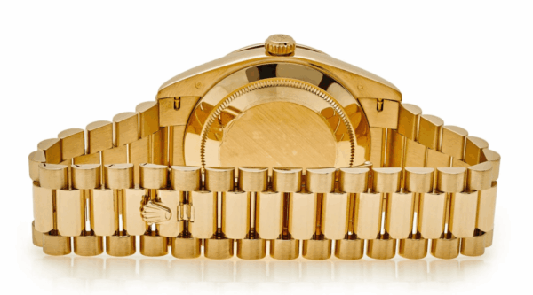 Day-date yellow gold roman dial ruby bezel 40mm