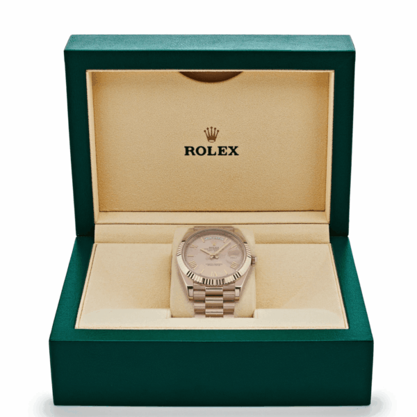 Day-date rose gold sundust roman dial 40mm