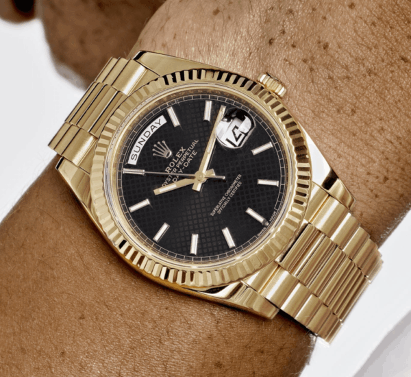 Day-date yellow gold black diagonal dial 40mm