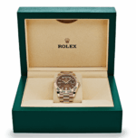 Day-date rose gold chocolate baguette diamond dial 40mm